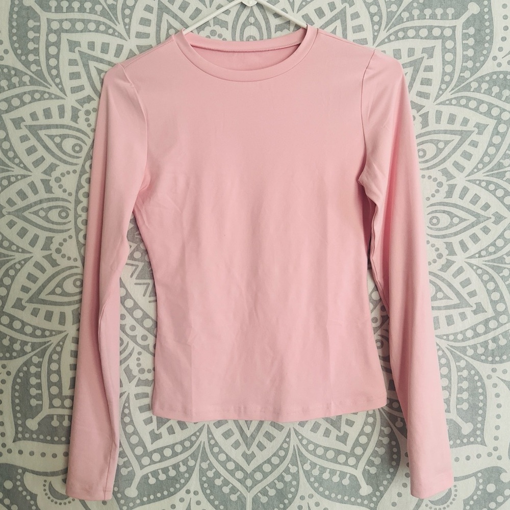 Pink tight fitted long sleeve shirt
